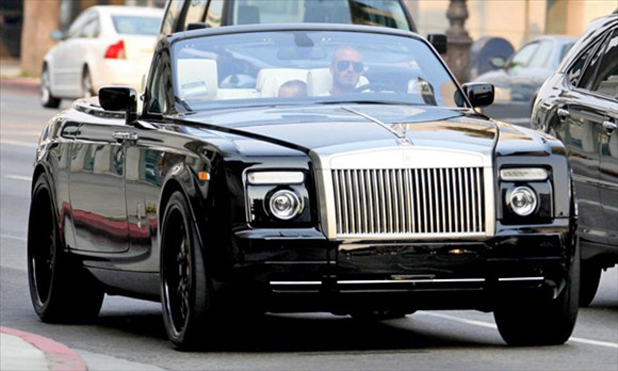 David Beckham and his Rolls-Royce Phantom Drophead Coupe David Beckham and his Rolls-Royce Phantom Drophead Coupe